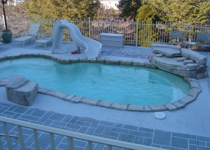 in ground swimming pool builder Michigan Clarkston, Milford, Fenton, Oxford, Lansing, Shelby Mi. inground Swimming pool Installation Clarkston Michigan Swimming Pool Sale www.bhpomi.com 12 - blue hawaiian pools of michigan sea swirl pool 09A