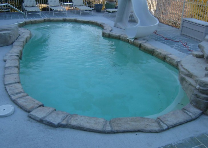 in ground swimming pool builder Michigan Clarkston, Milford, Fenton, Oxford, Lansing, Shelby Mi. inground Swimming pool Installation Clarkston Michigan Swimming Pool Sale www.bhpomi.com 16 - blue hawaiian pools of michigan sea swirl pool 9d