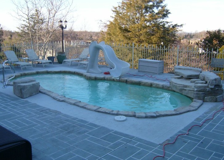 in ground swimming pool builder Michigan Clarkston, Milford, Fenton, Oxford, Lansing, Shelby Mi. inground Swimming pool Installation Clarkston Michigan Swimming Pool Sale www.bhpomi.com 16 - blue hawaiian pools of michigan sea swirl pool 09e