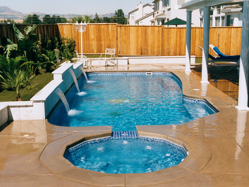 Carmel Fiberglass swimming pool spill over spa