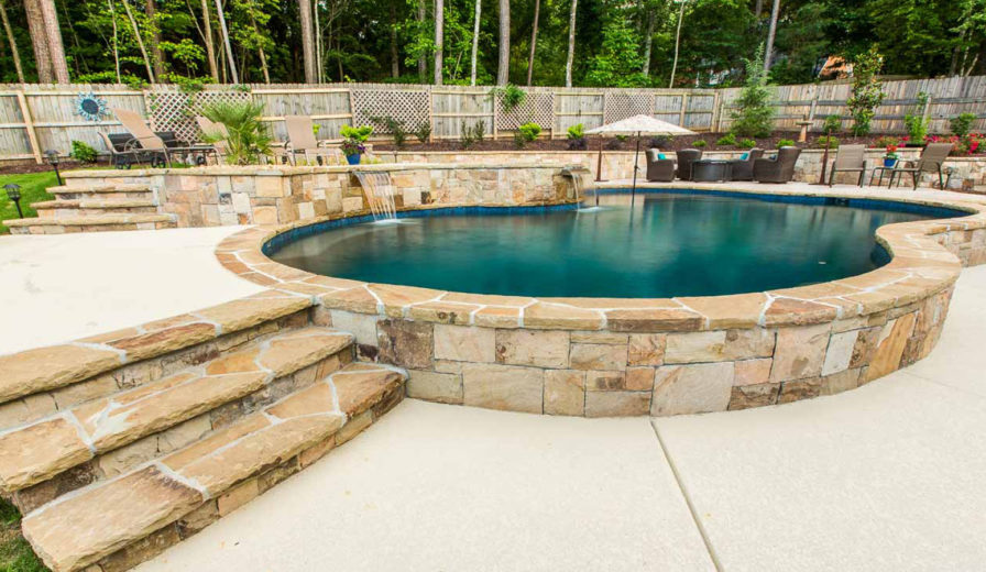 limestone retaining wall for pool blue hawaiian pools of michigan img